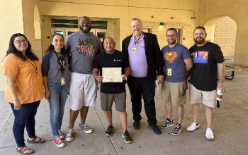 DO-SteppingOutFromBehindTheCounterAward1stSgtAlbertoGriego20240520 (1)
